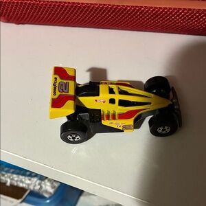 Yellow and Red Toy Race Car